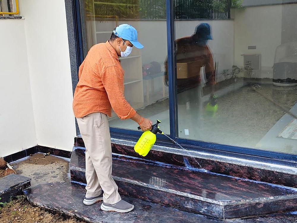 Residential anti-termite treatment at a villa entrance near Indirapuram